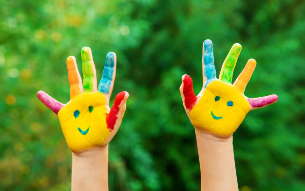 children-hands-colors-summer-photo-selective-focus_73944-497